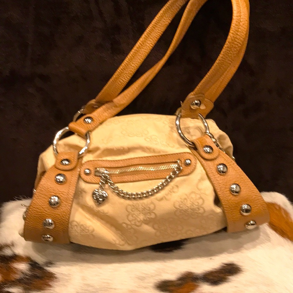 Women’s Tan/Brown shoulder bag by Kathy, with decorative chrome bangle detail!